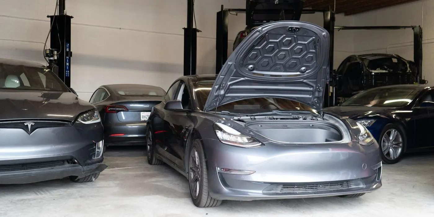 Tesla Model 3 with frunk open for routine maintenance